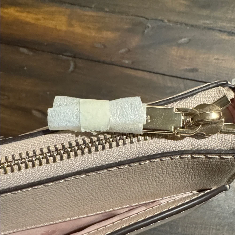 kate spade Warm Beige Leather Medium Top Zip Crossbody with Gold Heart Charm